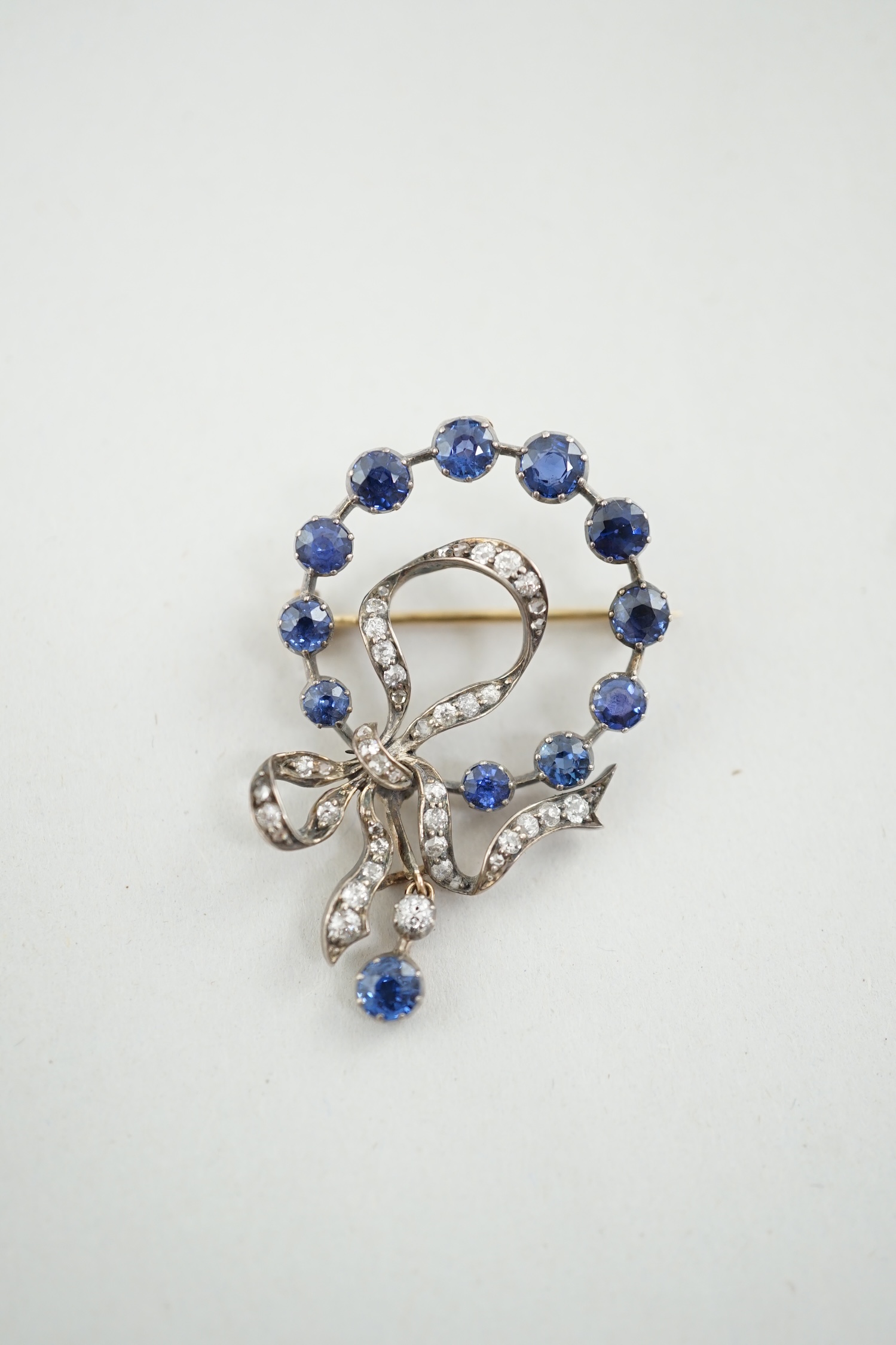 A Victorian gold and silver, sapphire and diamond cluster set drop pendant brooch